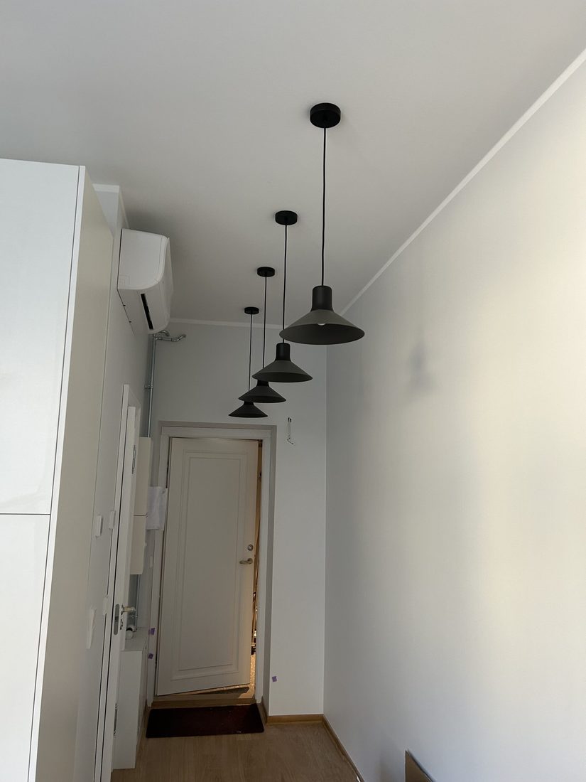 Light fitting installation at Grand Hotel Residents